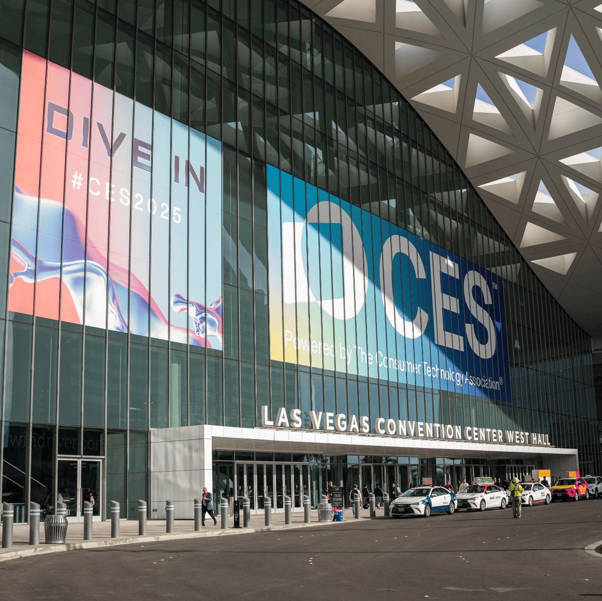 CES 2025 banners at the Las Vegas Convention Center West Hall.