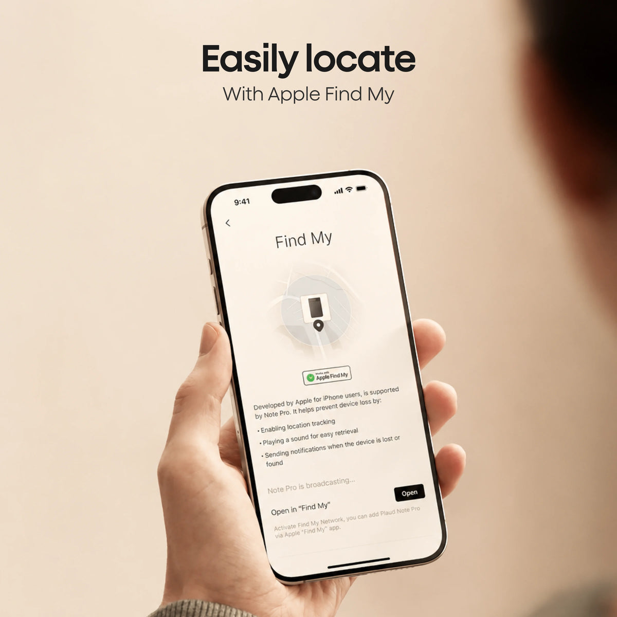 A person holds a smartphone displaying the Apple Find My integration for a Plaud Note Pro to enable location tracking and sound alerts.