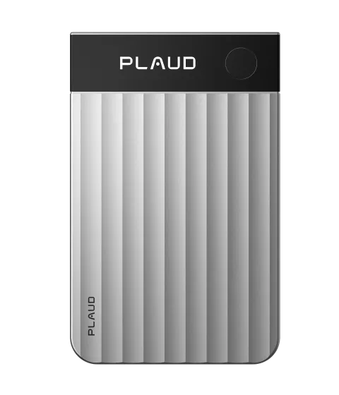 The silver Plaud Note Pro AI voice recorder has a glossy black glass top strip and a body with broad wavy vertical ridges.